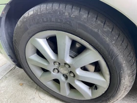 Toyota Avensis D4D - 116 к.с., снимка 13