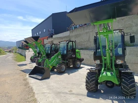 Телескопичен товарач Komatsu МАМУТ X -TRA, снимка 2