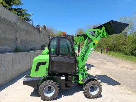 Телескопичен товарач Komatsu МАМУТ X -TRA, снимка 10