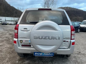 Suzuki Grand vitara 2.0i-4x4 бурзи бавни-климатроник-подгрев-Италия - 5900 € / 11539.40 лв. - 53136321 4