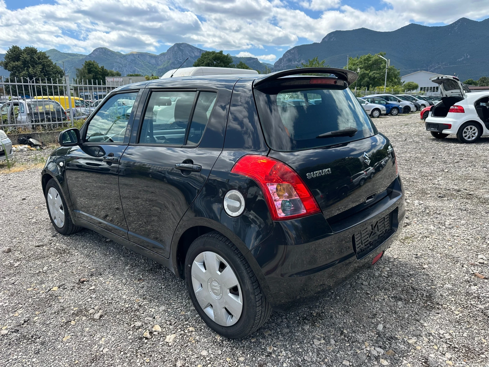 Suzuki Swift 1.3I-90kc - изображение 5
