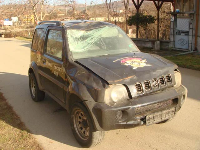 Suzuki Jimny 1.3i, снимка 1 - Автомобили и джипове - 46833934