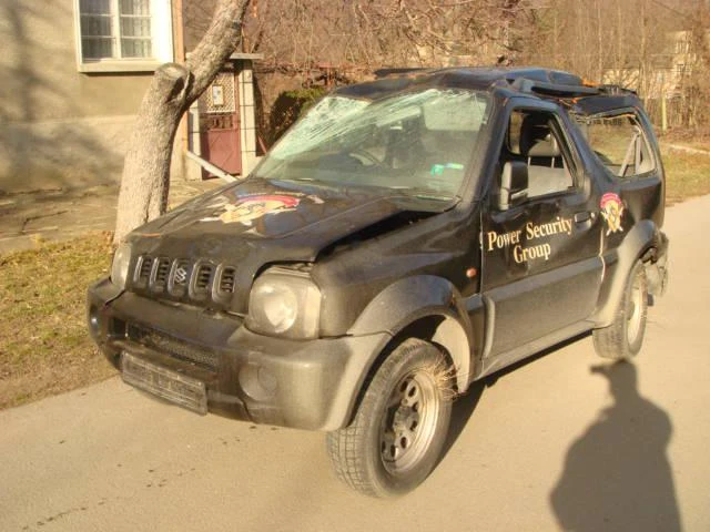 Suzuki Jimny 1.3i, снимка 2 - Автомобили и джипове - 46833934