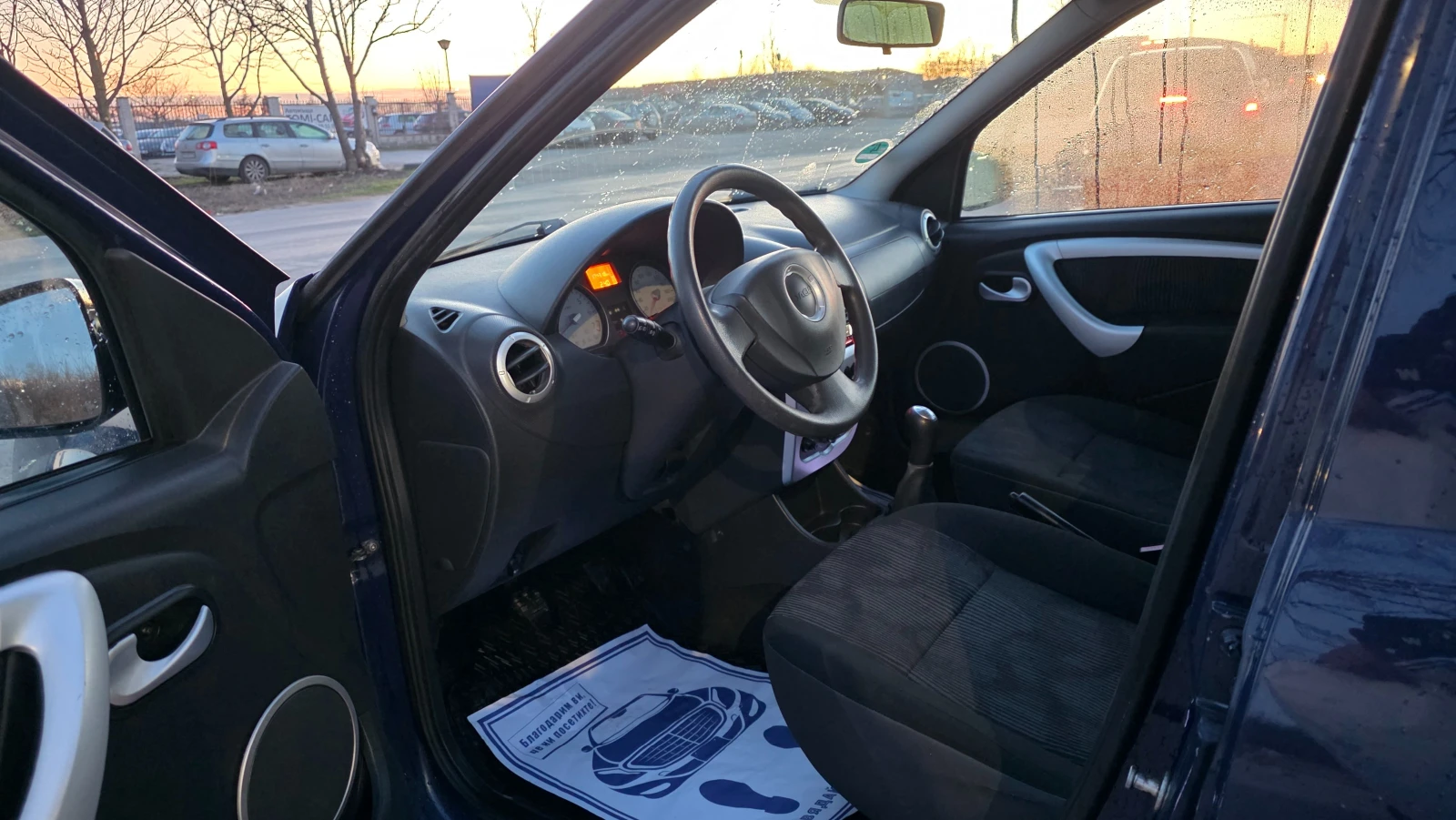 Dacia Logan 1.6i/87hp/УНИКАТ/FACE LIFT, снимка 10 - Автомобили и джипове - 53851418