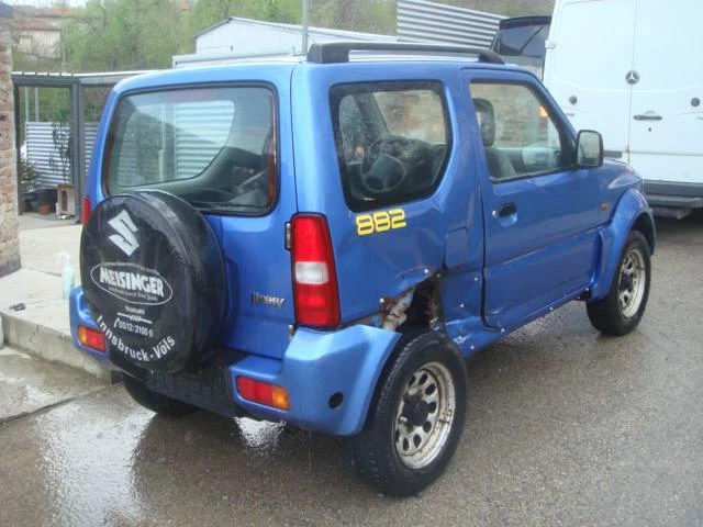 Suzuki Jimny 1.3i 4X4, снимка 3 - Автомобили и джипове - 46834409