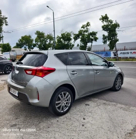 Toyota Auris 1.8HSD Swiss Aut., снимка 4