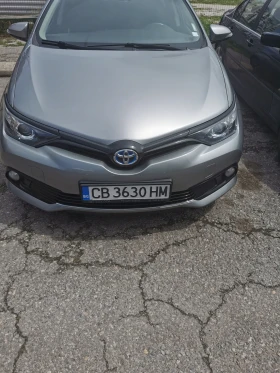 Обява за продажба на Toyota Auris Закупена нова от БГ, пълна сервизна история Хибрид ~26 900 лв. - изображение 1
