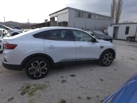 Renault Arkana 1.6 E-Tech Hybrid Бяла Перла| Навигация| Камера - 16500 € / 32271.19 лв. - 23460266 5