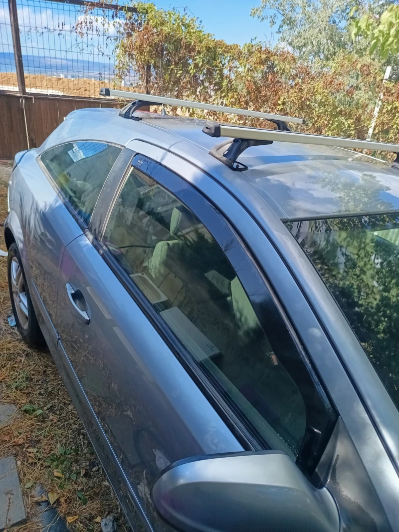 Opel Astra, снимка 6 - Автомобили и джипове - 52742160