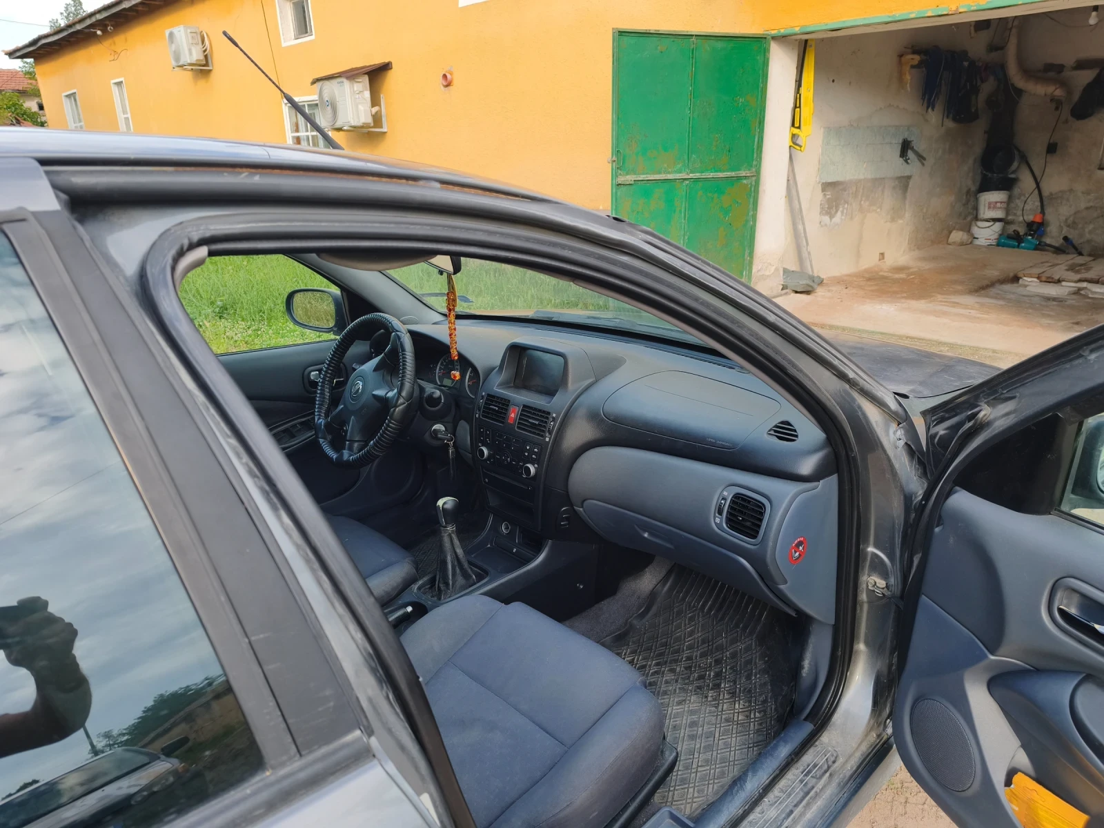 Nissan Almera, снимка 6 - Автомобили и джипове - 54936735