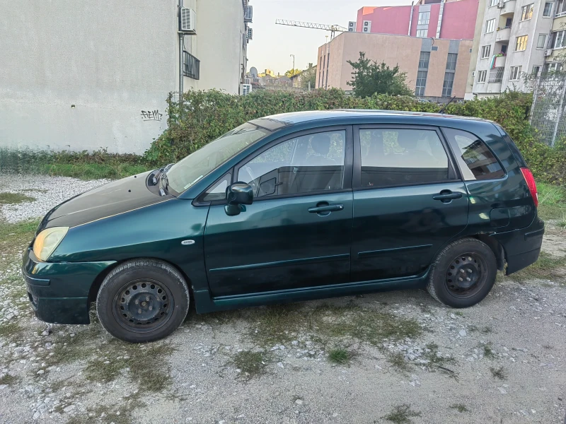 Suzuki Liana, снимка 5 - Автомобили и джипове - 47654559