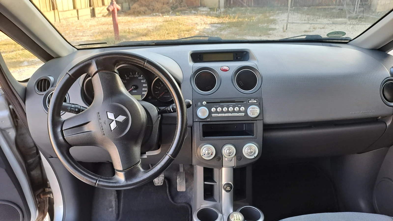 Mitsubishi Colt 1.3 - изображение 7
