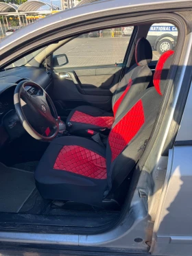 Opel Astra 1.6 Ecotec Газ/Бензин, снимка 9
