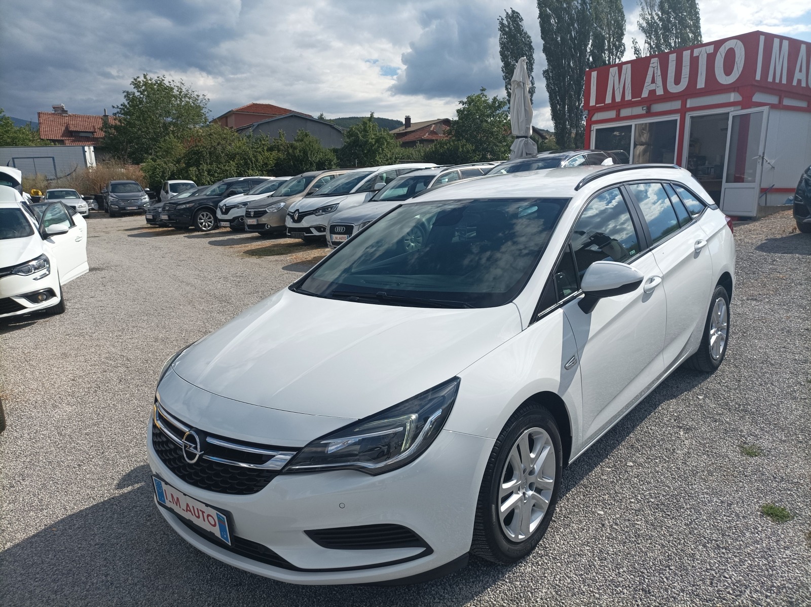 Opel Astra 1.0I-105K.C-EURO6-NAVI - изображение 1