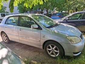 Toyota Corolla 1.6 i, снимка 1