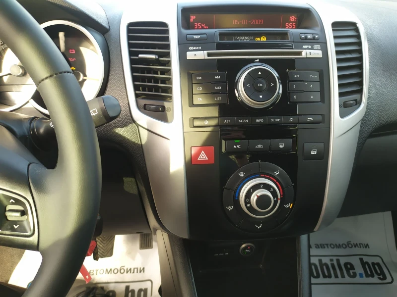 Kia Venga 1.4i 16v, снимка 12 - Автомобили и джипове - 52446712