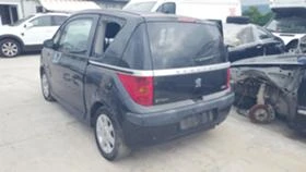 Peugeot 1007 1.4i 16v, снимка 7