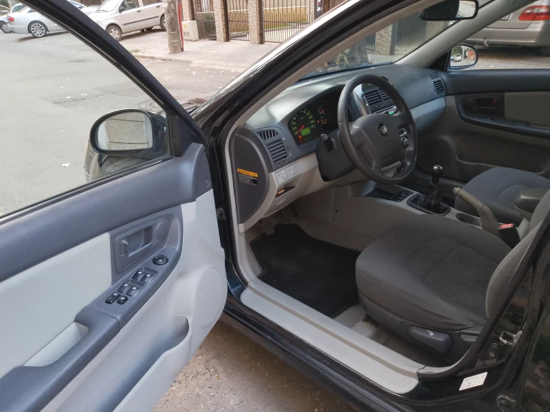 Kia Cerato, снимка 7 - Автомобили и джипове - 52539575