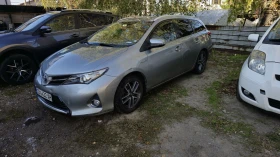 Toyota Auris 1.8i hibrid с ГАЗ 1