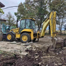 Багер Komatsu WB93S - изображение 1