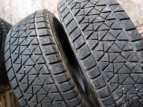 Гуми Зимни 215/70R16, снимка 2 - Гуми и джанти - 39148386