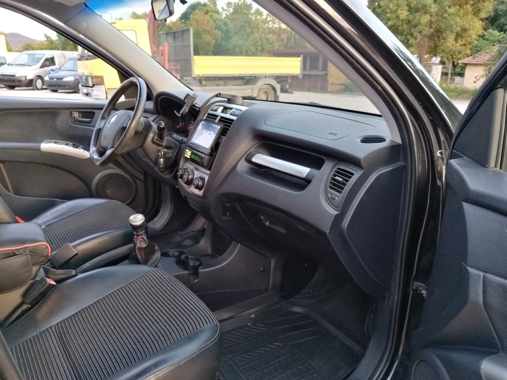 Kia Sportage 2.0 CRDI 4х4 NAVI, снимка 11 - Автомобили и джипове - 56077712