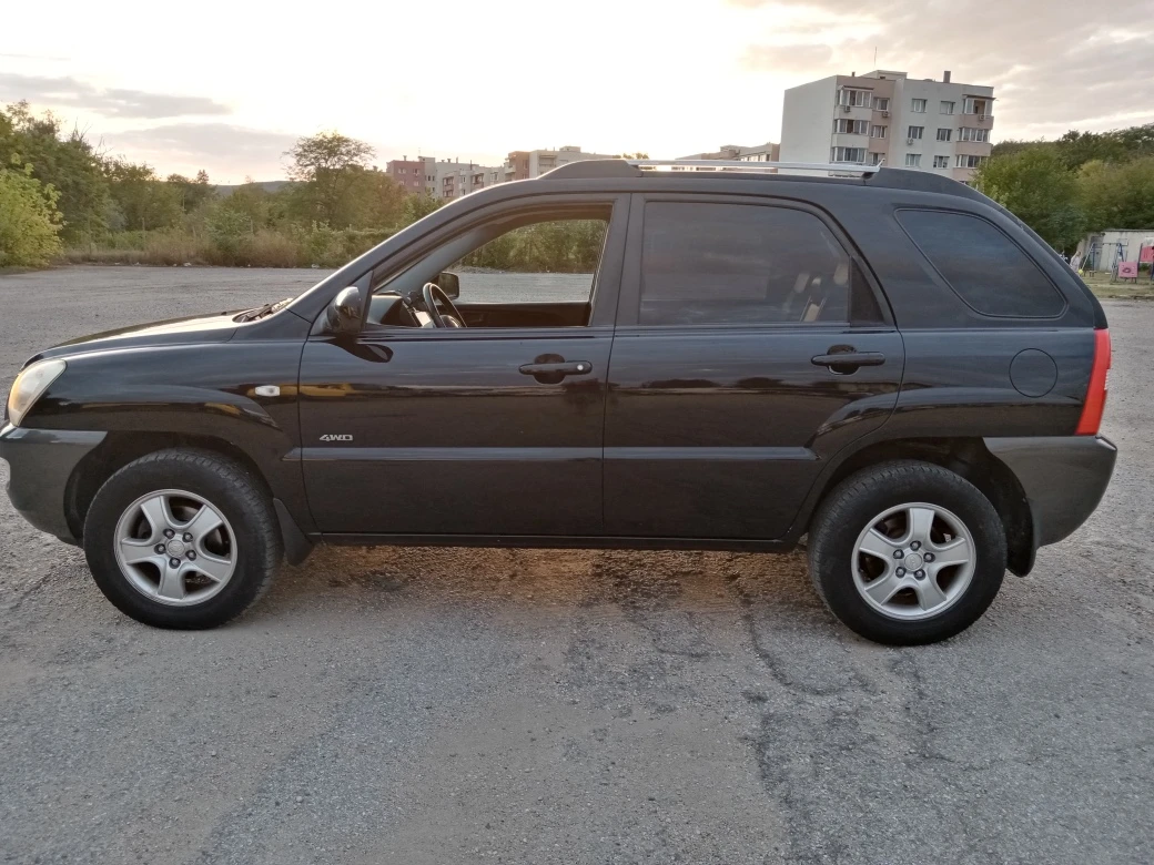 Kia Sportage 2.0 CRDI 4х4 NAVI, снимка 5 - Автомобили и джипове - 56077712