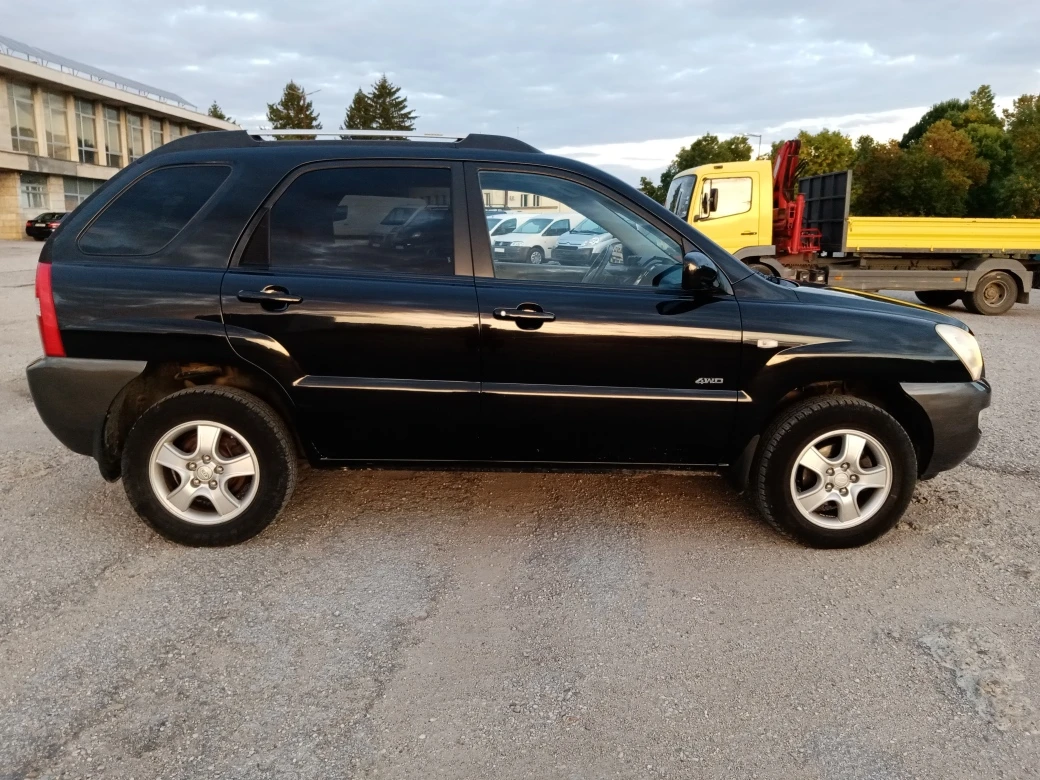 Kia Sportage 2.0 CRDI 4х4 NAVI, снимка 7 - Автомобили и джипове - 56077712