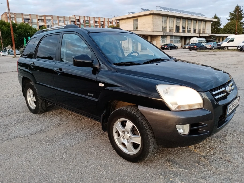 Kia Sportage 2.0 CRDI 4х4 NAVI, снимка 2 - Автомобили и джипове - 56077712
