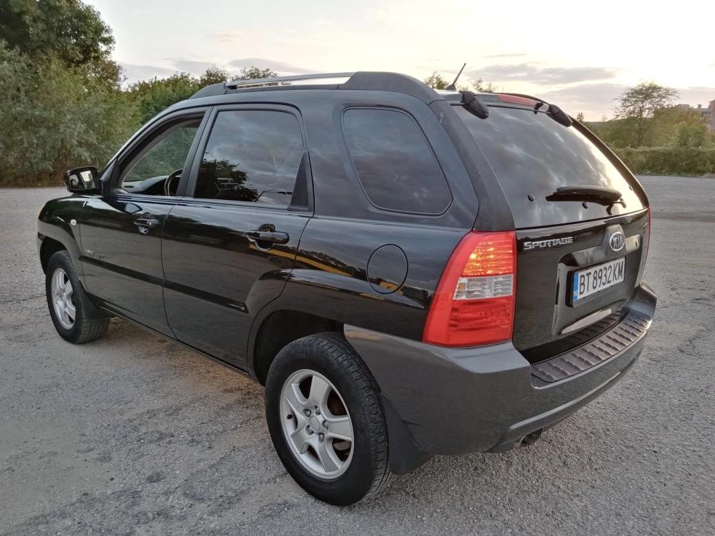 Kia Sportage 2.0 CRDI 4х4 NAVI, снимка 4 - Автомобили и джипове - 56077712
