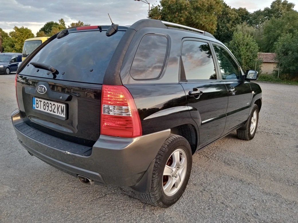 Kia Sportage 2.0 CRDI 4х4 NAVI, снимка 6 - Автомобили и джипове - 56077712