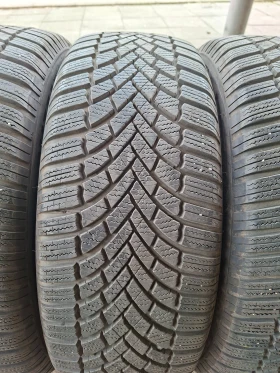      235/60R18