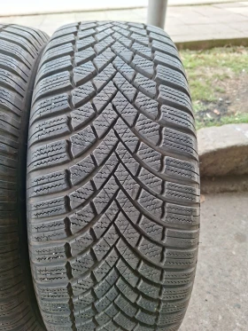      235/60R18