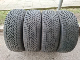      235/60R18