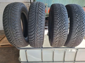 Гуми Зимни 175/70R14, снимка 1 - Гуми и джанти - 47662949