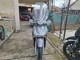 Honda Sh 150ie ABS старт стоп система уникално запазен, снимка 11 - Мотоциклети и мототехника - 53606261