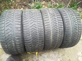 Гуми Зимни 245/45R18, снимка 1